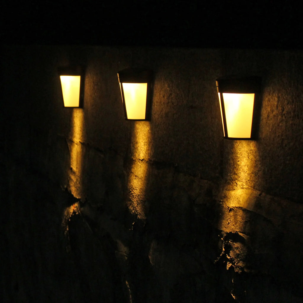 Solar-powered outdoor wall lamp with LED lights and sensor control for garden and courtyard illumination