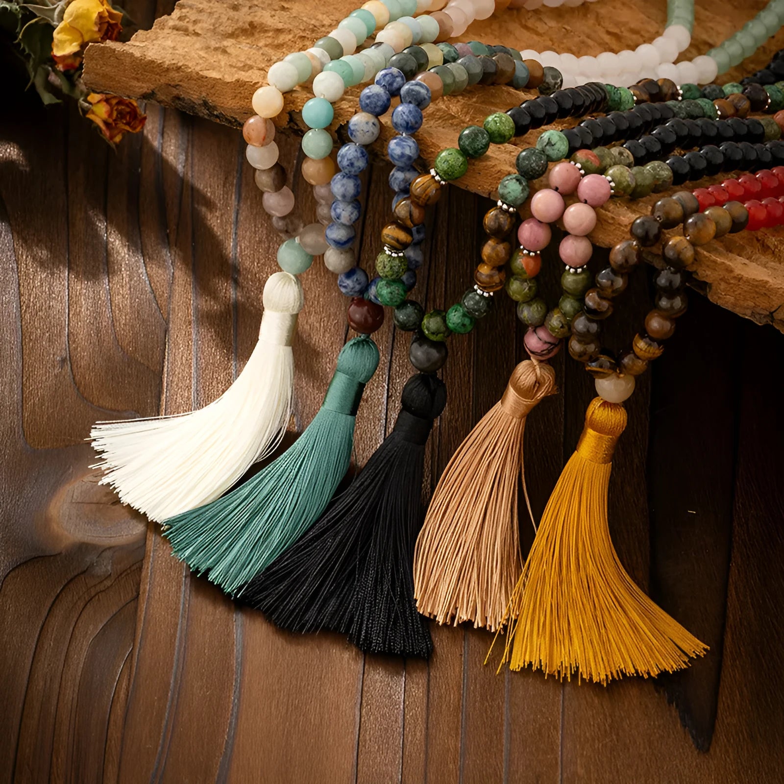 Vintage bohemian style beaded long necklace with matching bracelet showing geometric ball bead construction and tassel detail