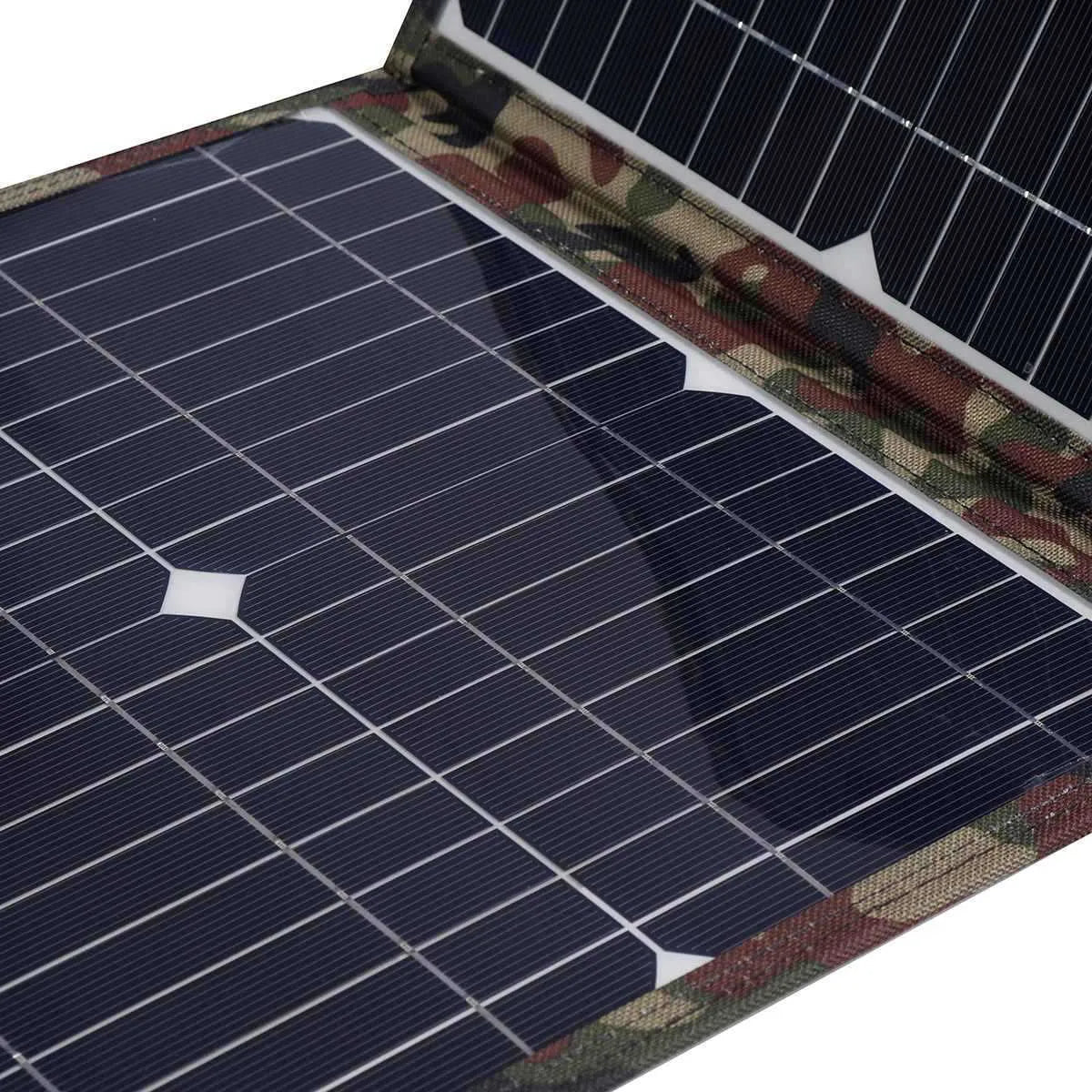 Black foldable 36W portable solar panel with car charger and USB hub accessories on a table.