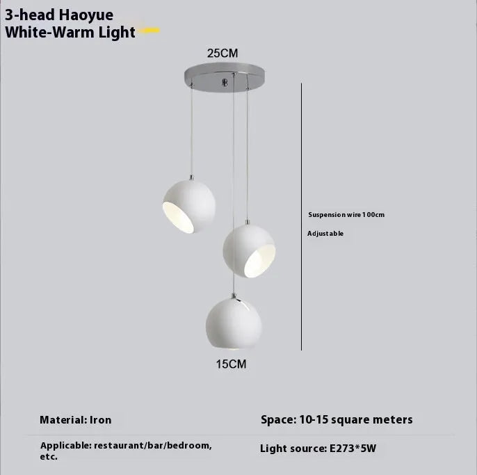 Modern ball chandelier table lamp in Nordic style, shown in single-head and three-head configurations.