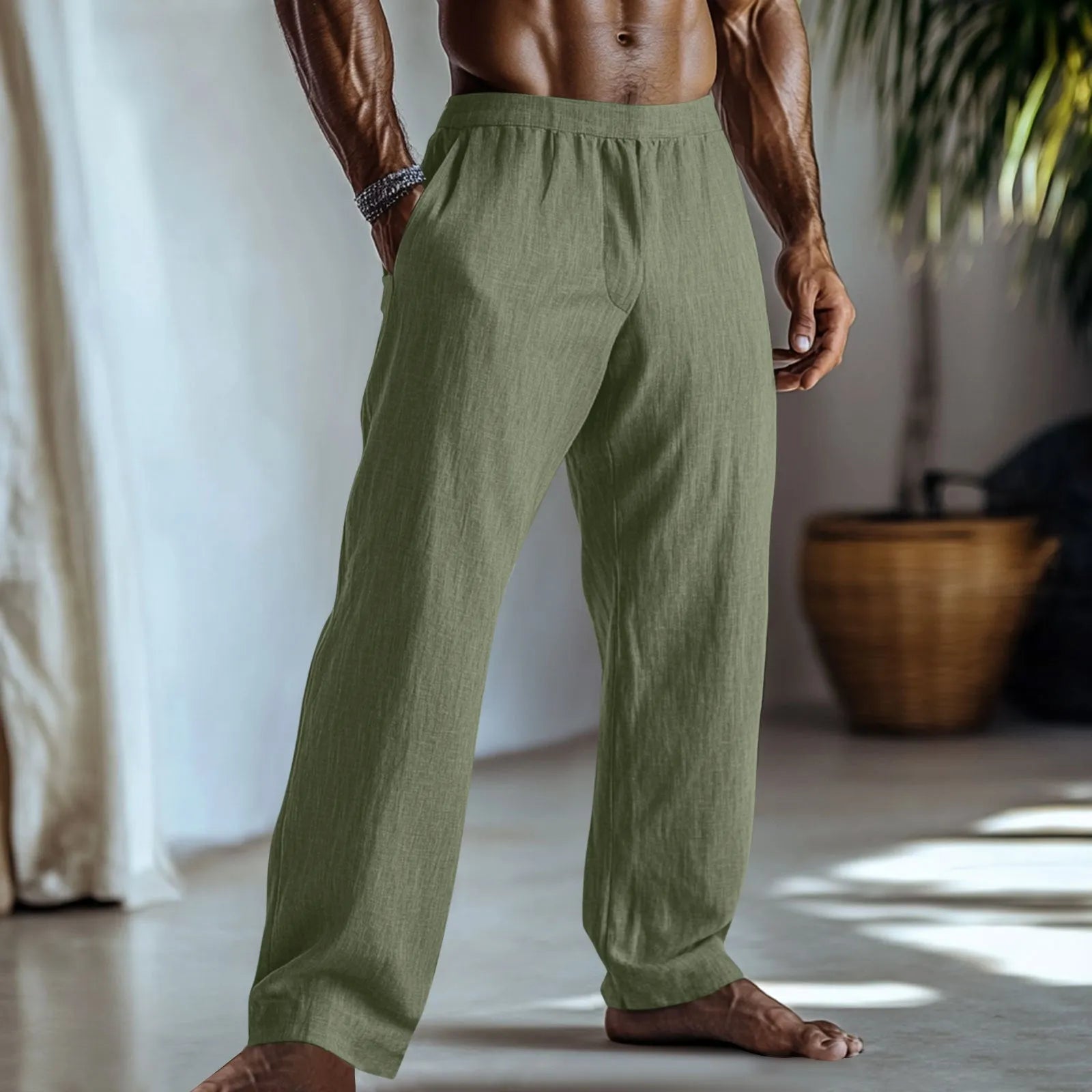 Cotton and linen straight leg casual trousers in light green colour, showing front view with pockets.