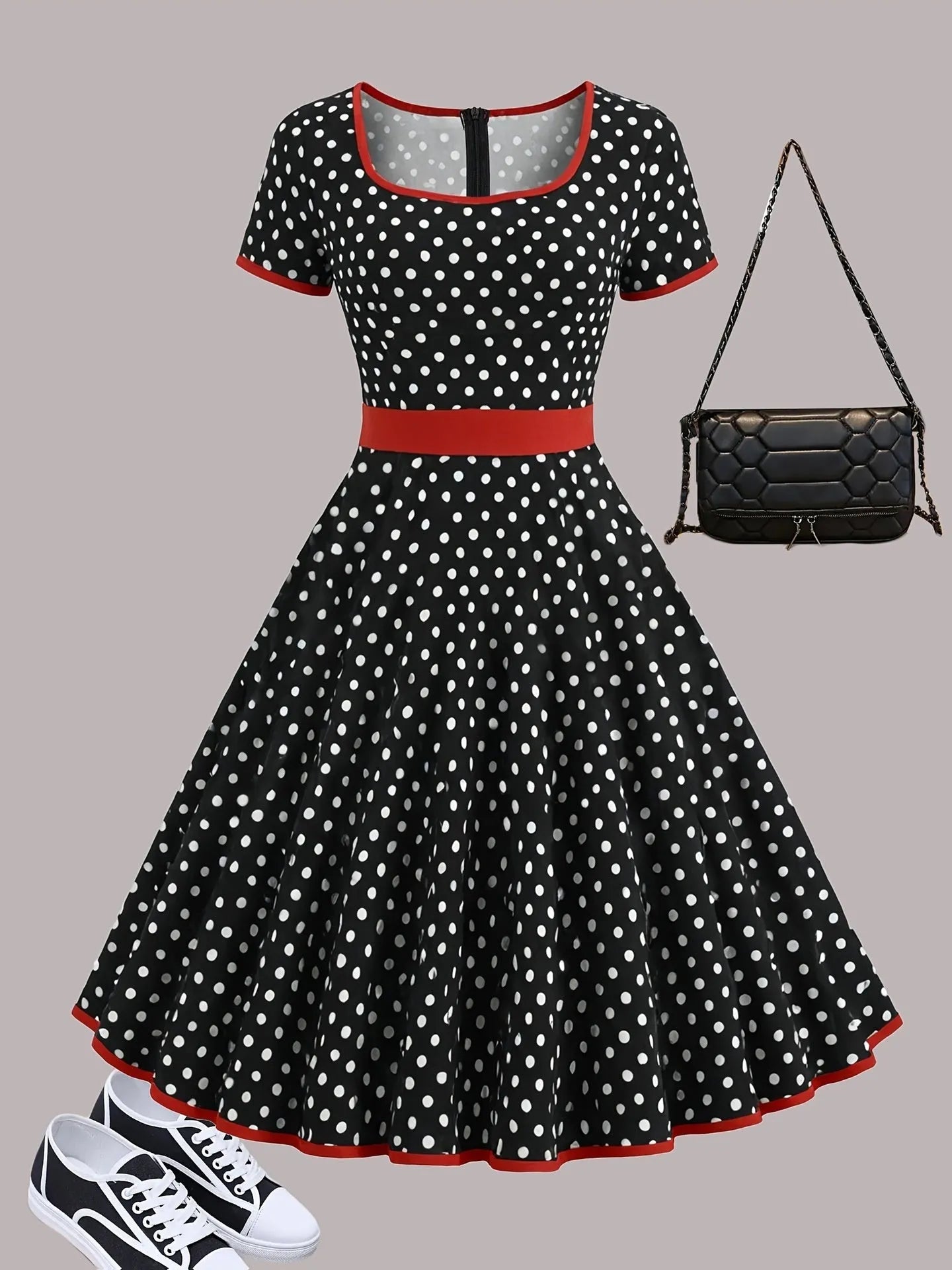 Women's mid-length polka dot dress with square collar, front zip, and pleated skirt