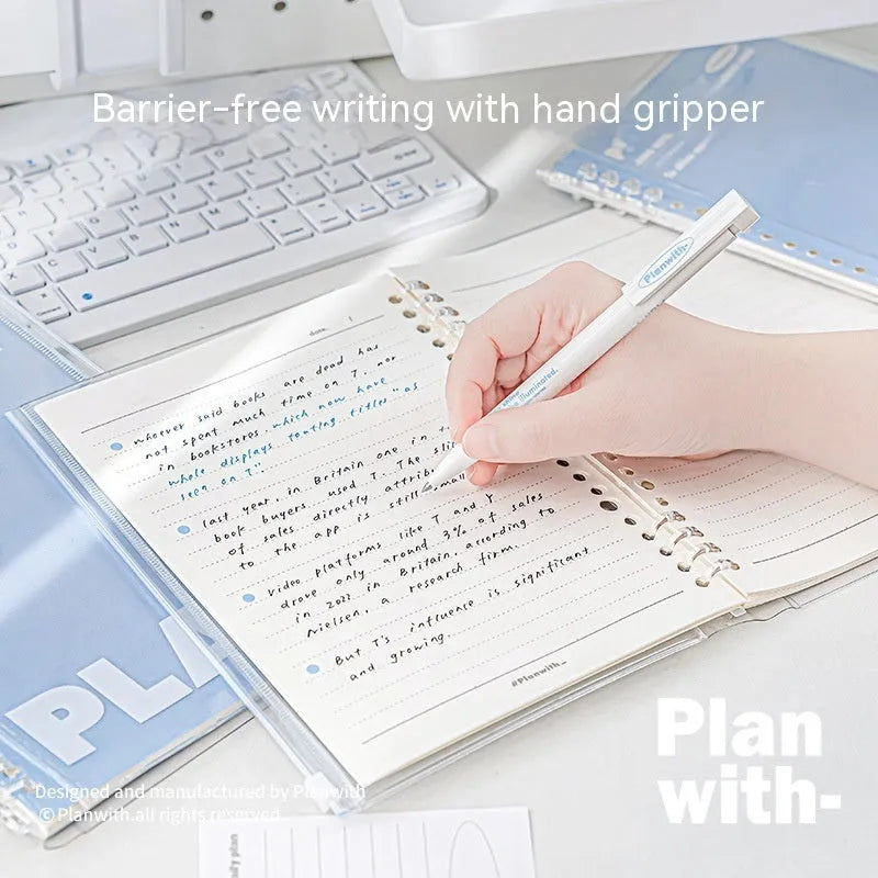 A5 spiral notebook with transparent PVC cover in blue, showing loose pages inside, next to a white version.
