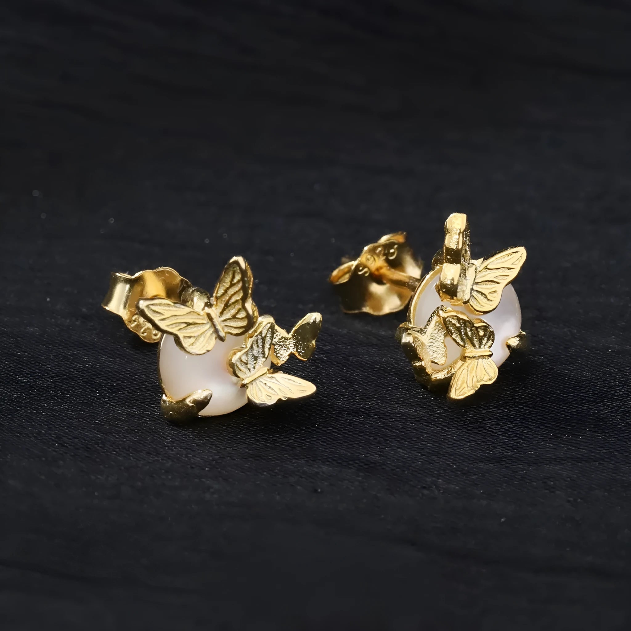 Butterfly-themed sterling silver ear studs with electroplated gold or white gold finish