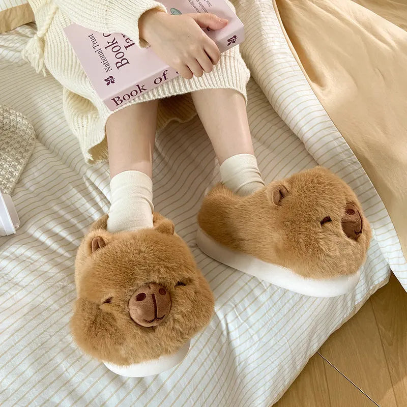 Light brown women's winter slippers with plush upper and cartoon pattern