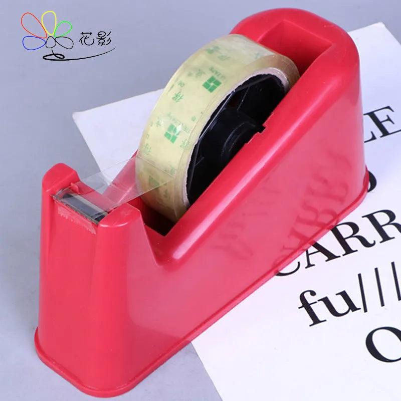 Dual-purpose tape cutter with PS body and stainless steel blade on a desk