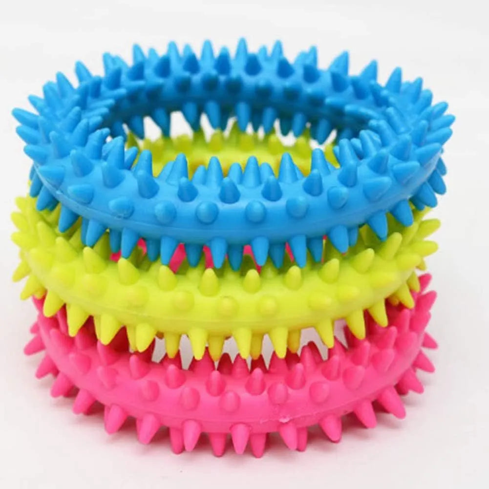 Blue spiky circle ring dog chew toy made of TPR on a white background.