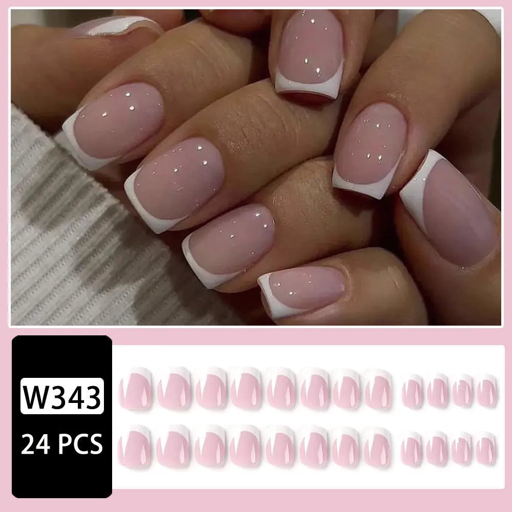 24 white acrylic nail tips with plaid pattern design arranged on display