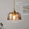 Nordic retro style brass and glass pendant chandelier light for restaurant ceilings.