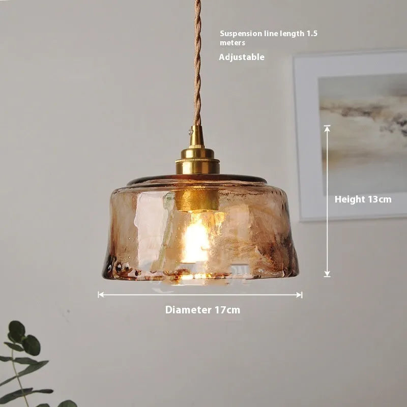Nordic retro style brass and glass pendant chandelier light for restaurant ceilings.