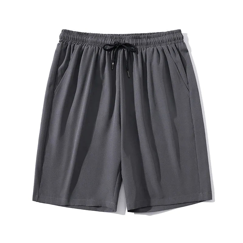 Men's quick-dry nylon cropped sports pants in black colour with straight-leg design