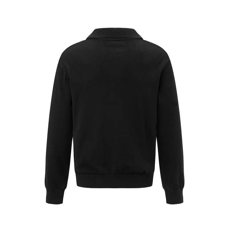 Men's loose fit pullover sweater in beige, black, and dark grey colours on a hanger