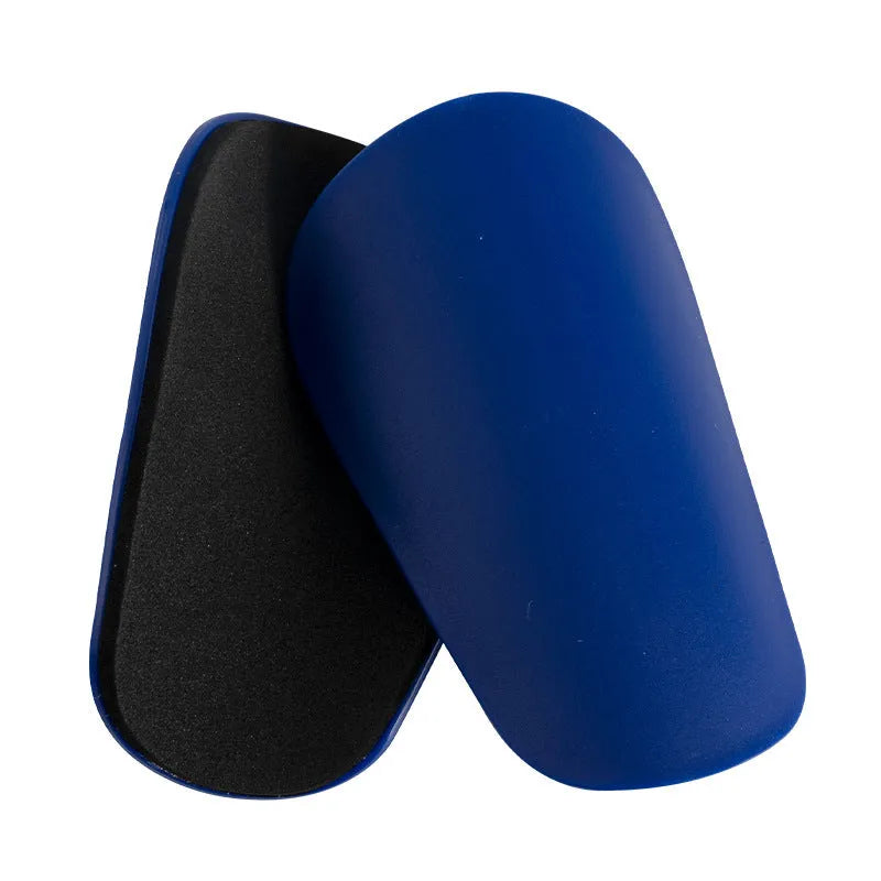Pu mini shin guards in black, white, red, and blue for football running and hiking sports protection.