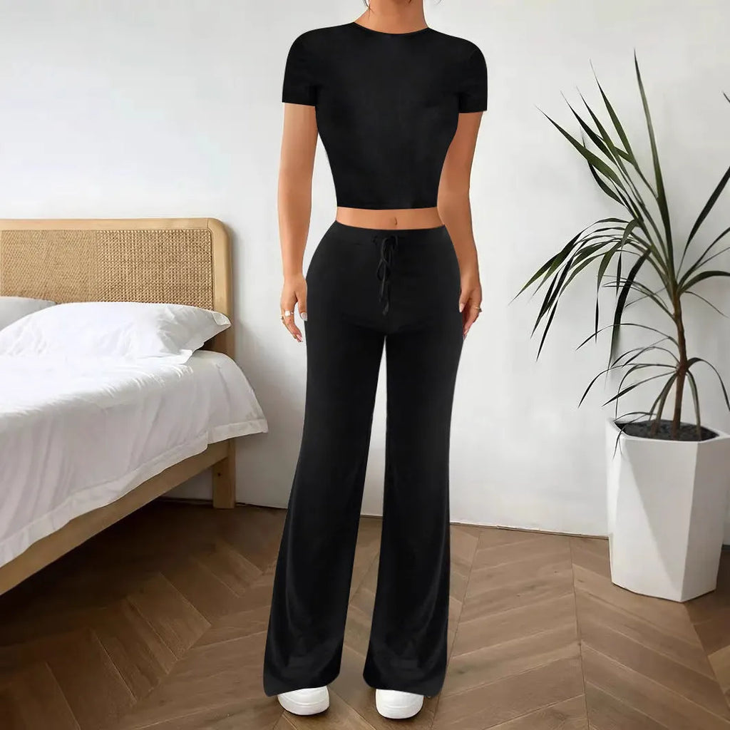 Black women's co-ord set with high waist trousers and a regular sleeve t-shirt
