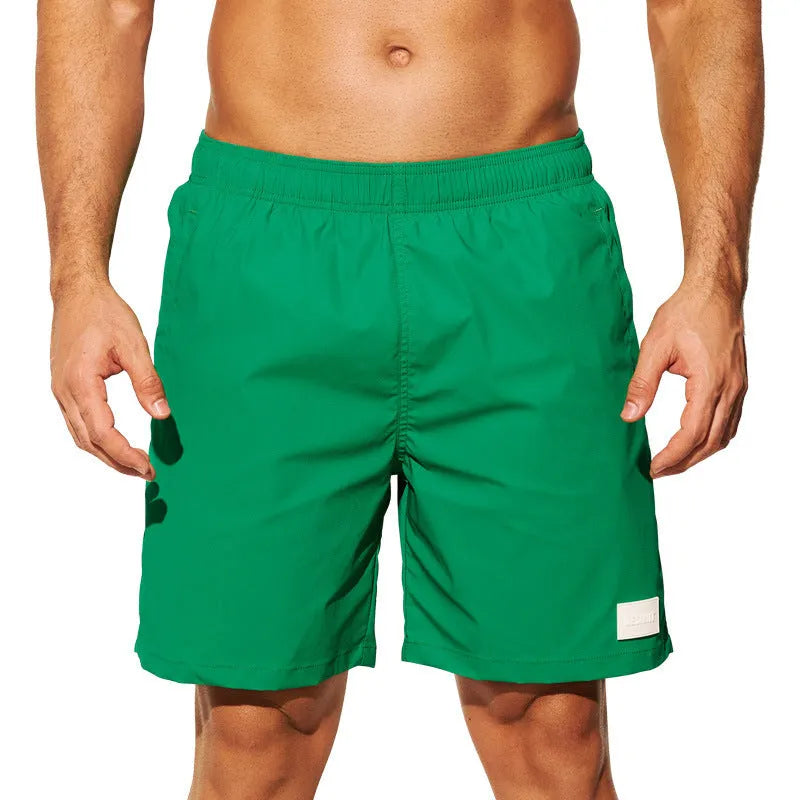 Men's solid colour quick-drying nylon sports shorts on a size chart