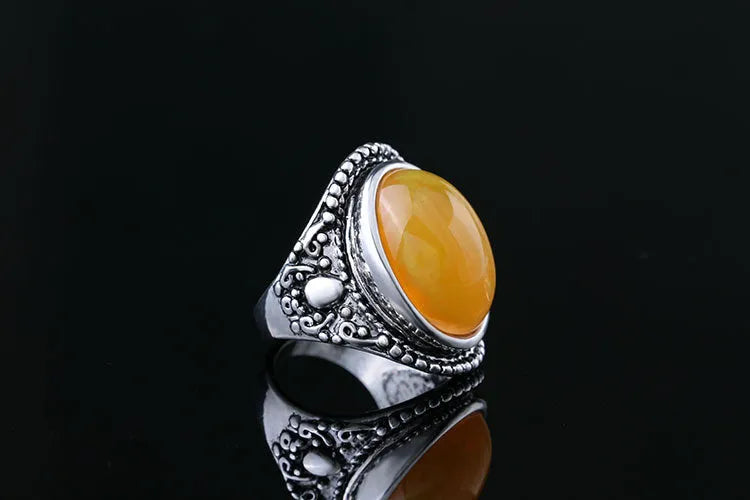Geometric retro alloy ring with fluorescent beeswax centrepiece in antique silver Amber colour