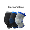 Silicone massage spring bar shock absorber knee pad in black and blue colour, shown with cotton material and sizing tag.