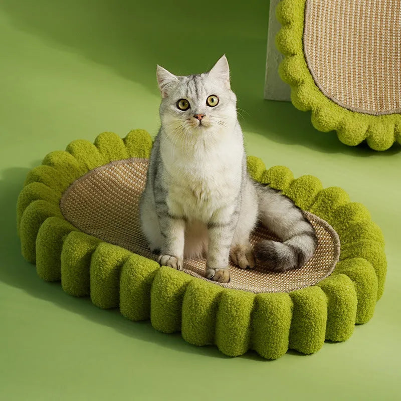 Green oval cat scratch pad bowl with sisal scratching surface serving as cat bed and furniture protector