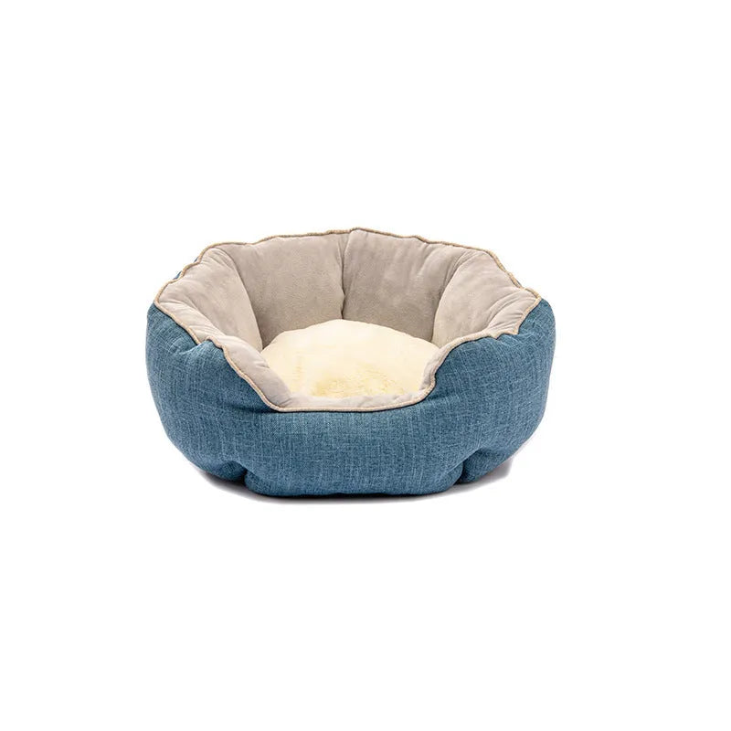 Blue octagonal pet bed with removable mat for a small dog or cat.