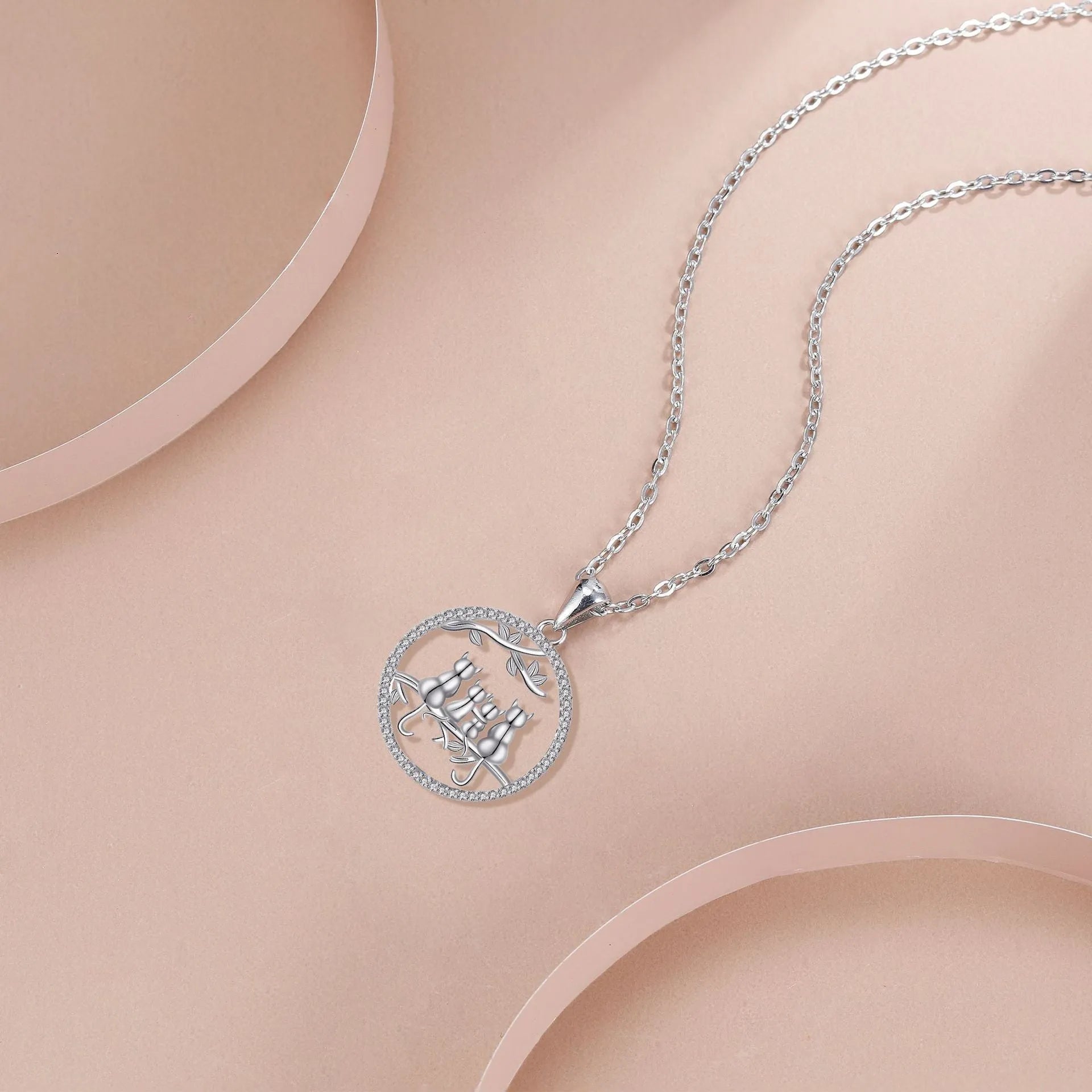Four Kitten Necklace with cat motif pendant on cross chain