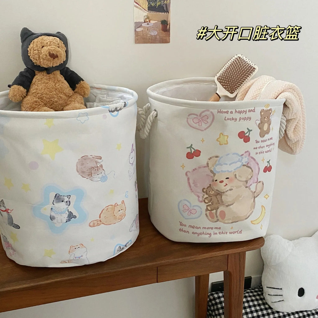 Foldable cotton laundry basket in decorative pattern options including Good Night Bear and Mint Green Western Highland