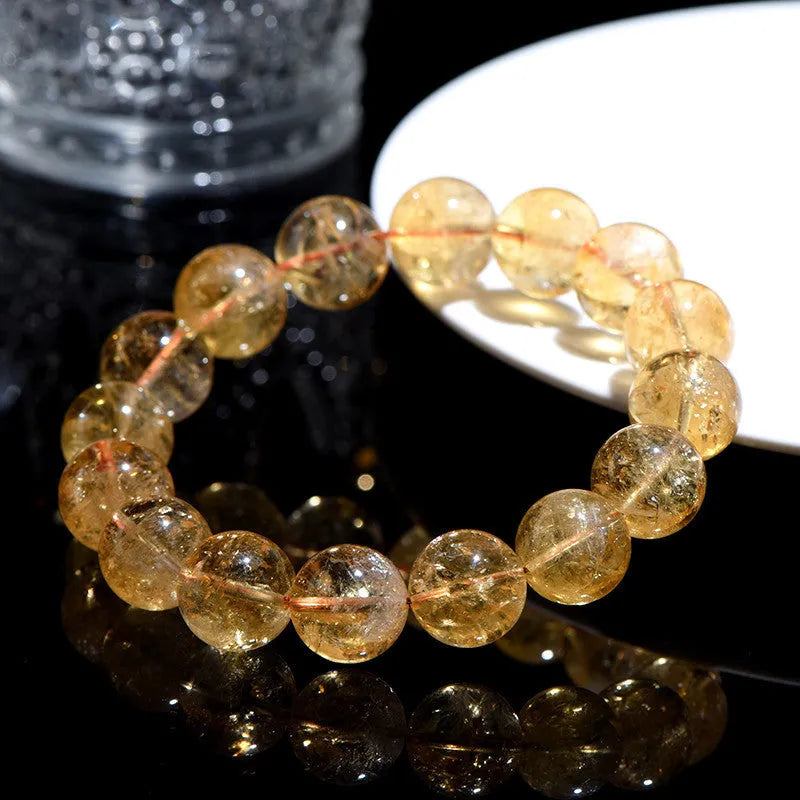 Natural yellow citrine bracelet with Asestelle beads in Brazilian yellow or violent yellow colour options.