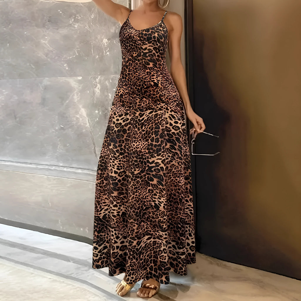 Dark brown leopard print sleeveless dress with round neck and sling straps, made from milk silk polyester fabric.