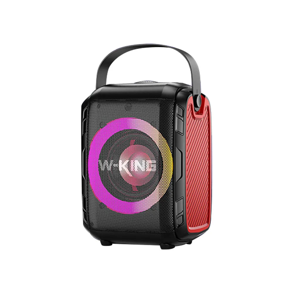 Black Bluetooth speaker with cool light circle in horizontal position on table