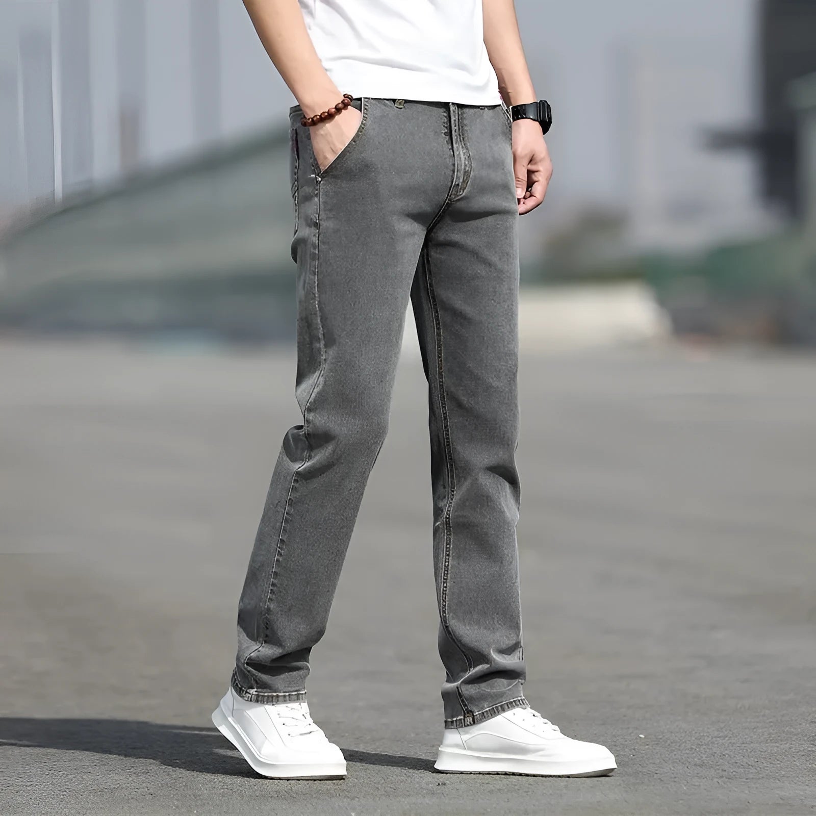 Men's smoky gray straight leg jeans with high elasticity rabbit fur fabric on low waist mannequin