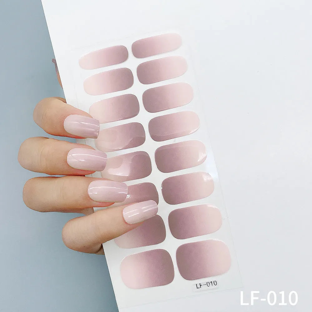 Pack of 16 solid colour full nail art stickers showing designs like cross, rose, tulip, and flower.