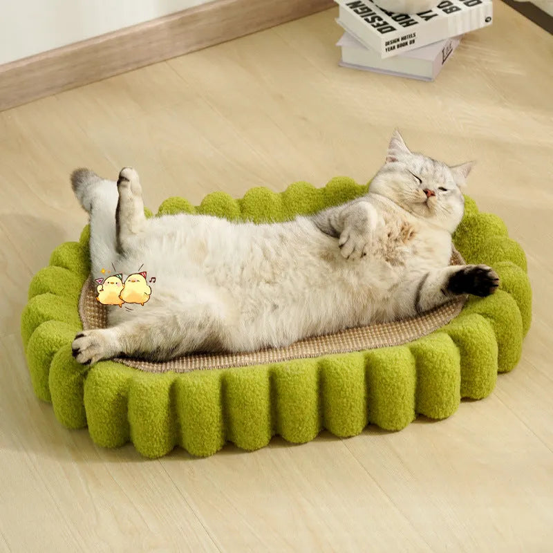 Green oval cat scratch pad bowl with sisal scratching surface serving as cat bed and furniture protector