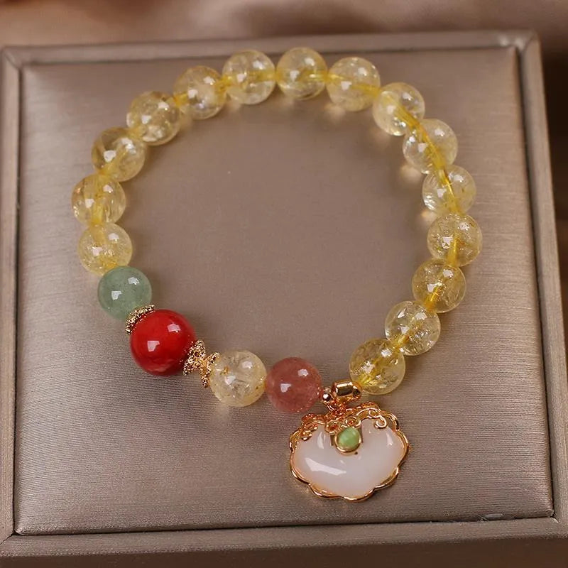 Yellow hair crystal jade ruyi pendant bracelet with natural citrine stones in alloy setting