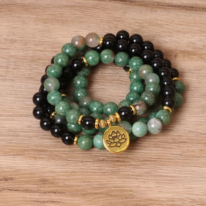 Green and black elastic beaded long bracelet with alloy beads on stretch band