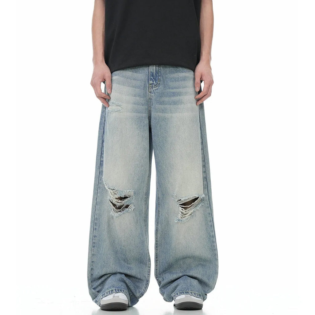 Blue straight-leg men's jeans with ripped detailing and retro summer styling