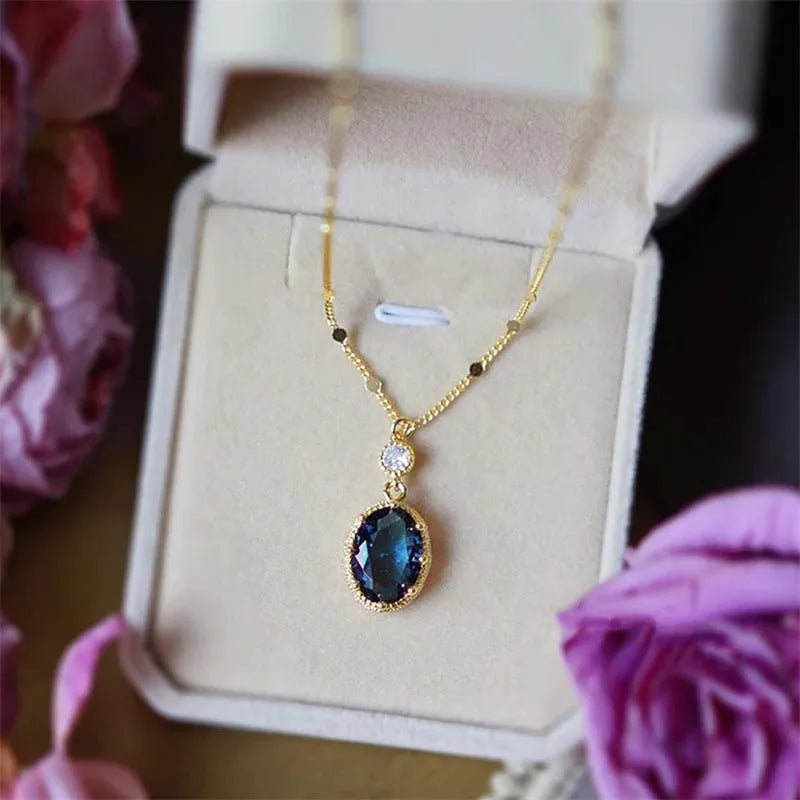 Geometric French retro necklace with electroplated gold colour finish on copper pendant