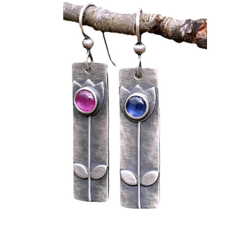 Antique finish red sapphire electroplated metal earrings with geometric ellipse design