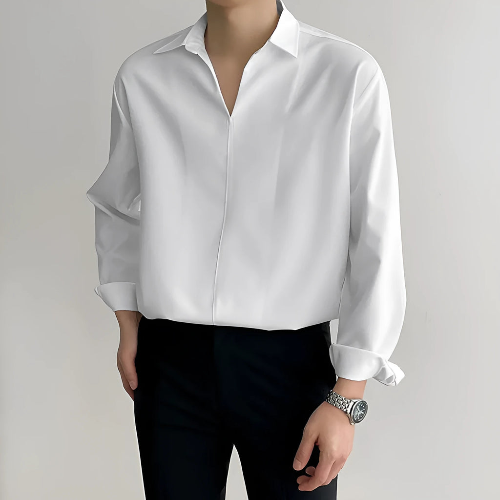 Men's loose lapel casual shirt in solid colour on a hanger, showing long sleeves and pullover style.