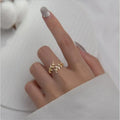 Women's copper leaf branch ring with geometric design in gold or silver electroplated finish