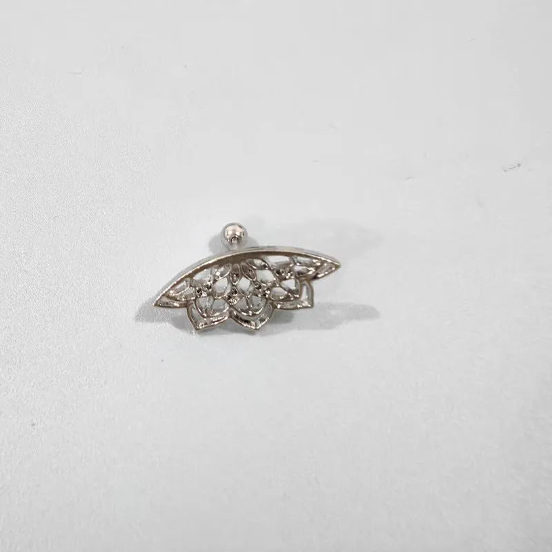 Spider web design stud earrings in gold and silver electroplated metal.