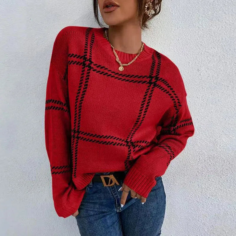 Women's loose-fit plaid colour-block acrylic sweater in apricot, black, beige, red, and green stripes.