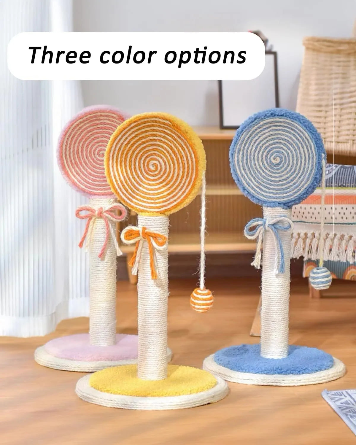 Blue sisal rope cat scratching post with a hanging ball toy on a sturdy wooden base.