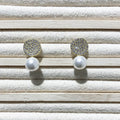 Round diamond studded pearl earrings in gold finish with secure stud fastening
