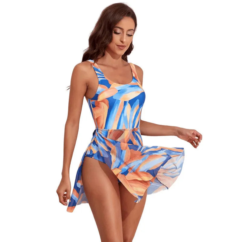 Women's single-shoulder one-piece swimsuit with colourful floral digital print on slim waist.
