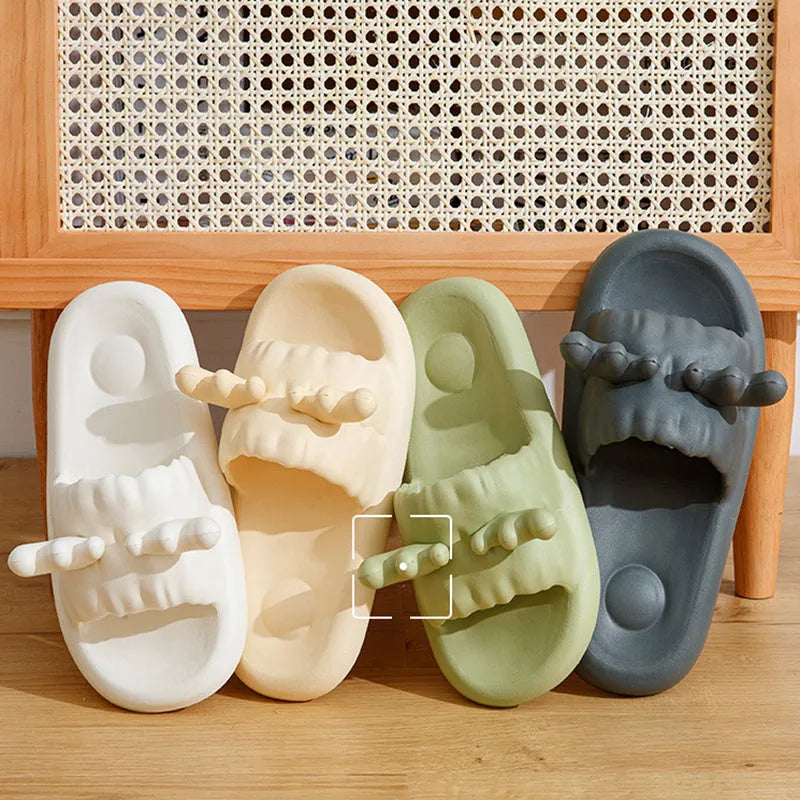 Deer horn design EVA flip flop slippers in light yellow, showing hollow out upper and textured sole.