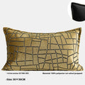 Gold and white abstract geometric patterned cushion cover on a grey sofa, showing 45x45cm square size option.