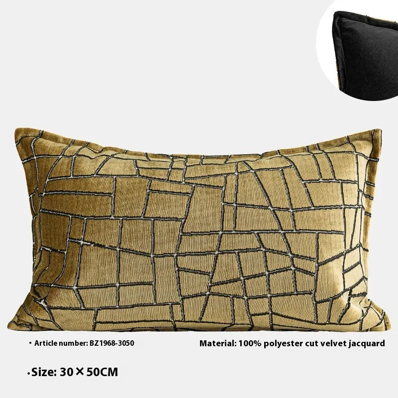 Gold and white abstract geometric patterned cushion cover on a grey sofa, showing 45x45cm square size option.