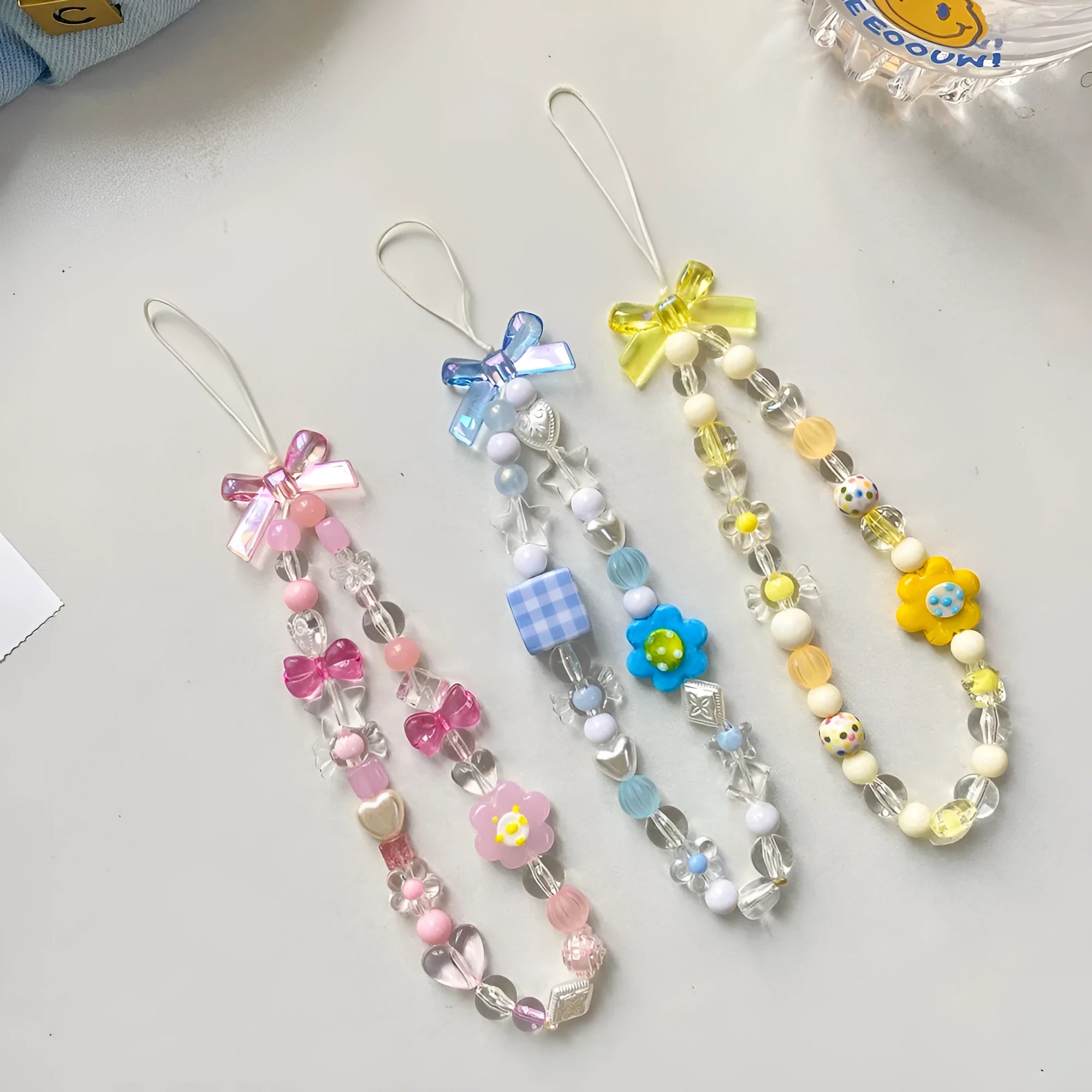 Floral bead mobile phone lanyard with plastic resin decoration in yellow blue pink colour options