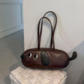 Sausage dog crossbody bag in coffee brown matte finish with single shoulder strap and horizontal shape