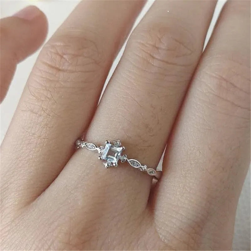 Rose gold copper ring on white background showing plain band design