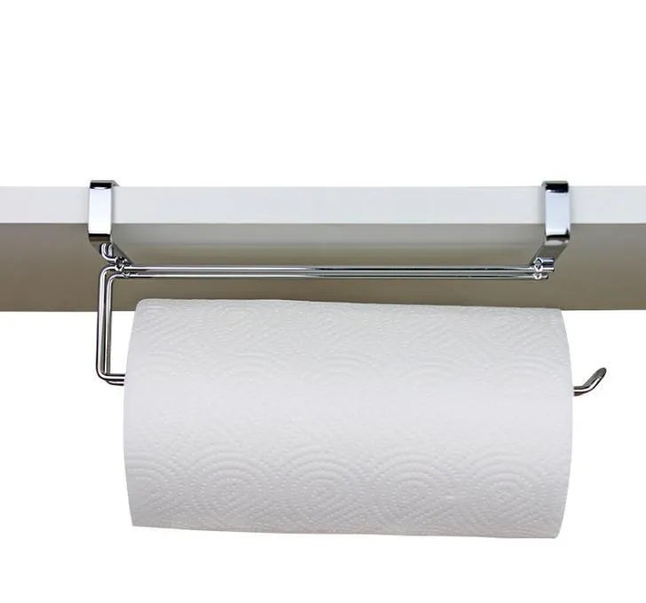 Silver stainless steel paper towel rack mounted on a kitchen cabinet door.